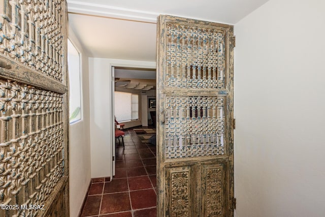 2600 E Skyline Dr Unit 21, Tucson, AZ 85718 - hall with dark tile patterned floors