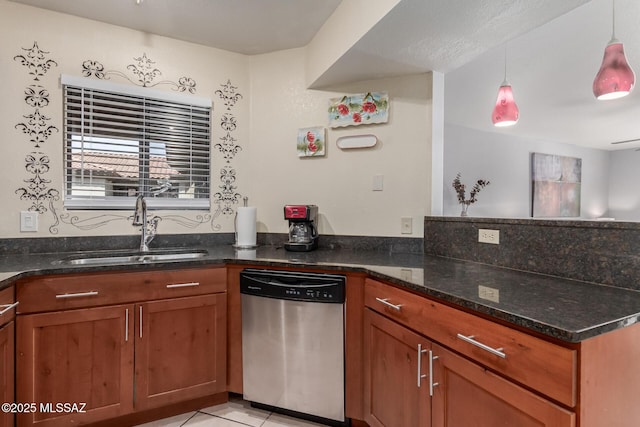 5751 N Kolb Rd Unit 25203, Tucson, AZ 85750 - kitchen featuring dishwasher, a sink, a peninsula, dark stone counters, and brown cabinetry