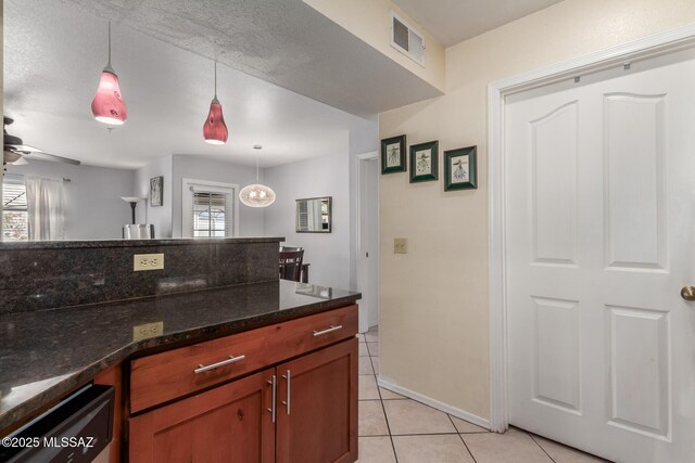 5751 N Kolb Rd Unit 25203, Tucson, AZ 85750 - kitchen with plenty of natural light, light tile patterned flooring, pendant lighting, and a ceiling fan
