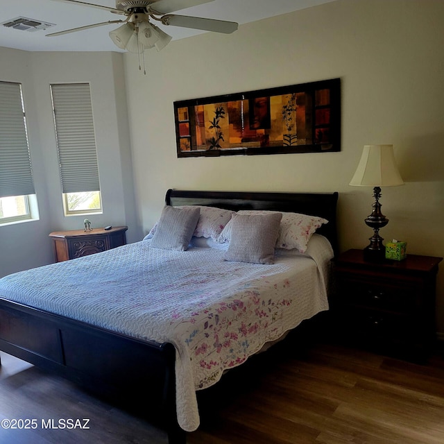 536 W Deerview Ct, Green Valley, AZ 85614 - bedroom featuring wood finished floors and a ceiling fan