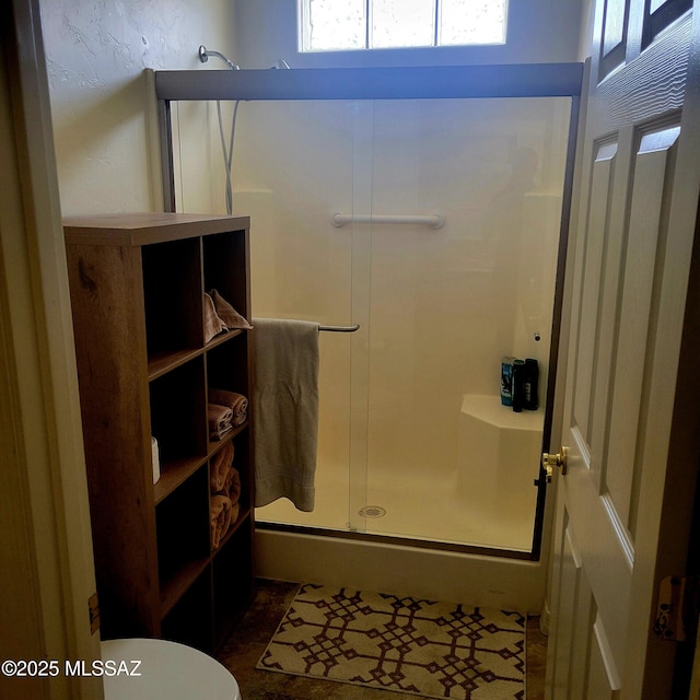 536 W Deerview Ct, Green Valley, AZ 85614 - bathroom with a stall shower and toilet