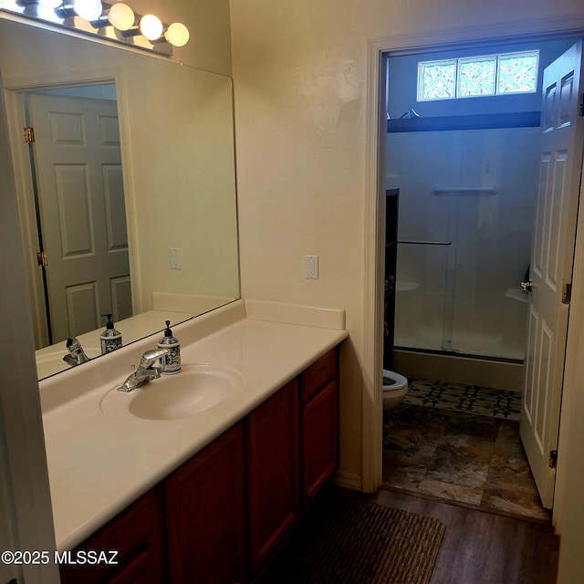 536 W Deerview Ct, Green Valley, AZ 85614 - full bath with toilet, a shower with shower door, vanity, and wood finished floors