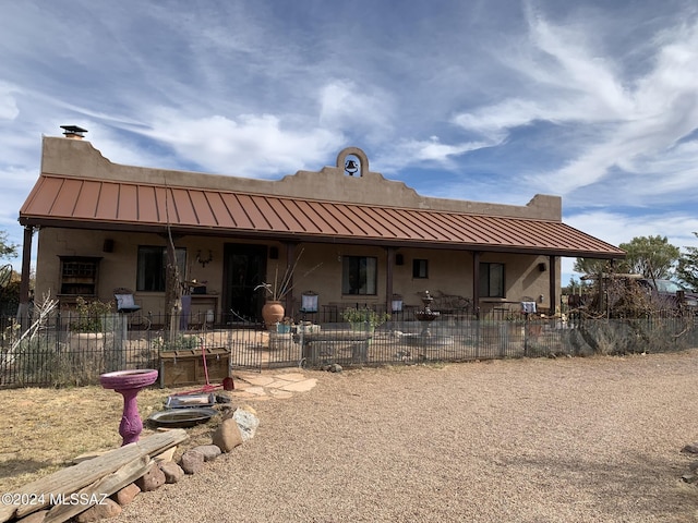 1606 N Panorama Way, Cochise, AZ 85606 - view of front of house with a standing seam roof, metal roof, stucco siding, and a chimney