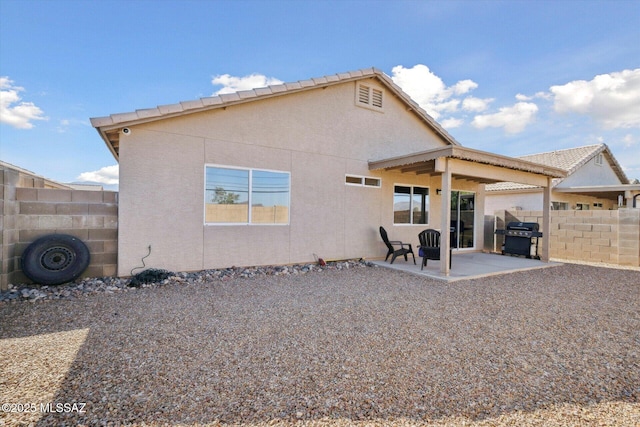 8079 N Eve Ann Way, Tucson, AZ 85741 - back of property with a patio and stucco siding