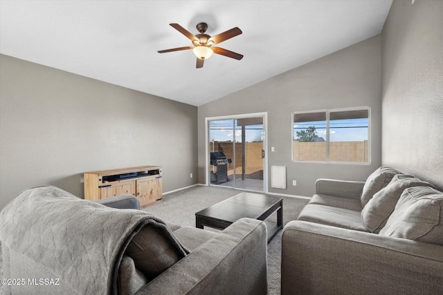 8079 N Eve Ann Way, Tucson, AZ 85741 - living area featuring ceiling fan, vaulted ceiling, light colored carpet, and baseboards