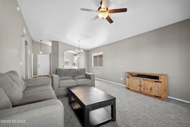 8079 N Eve Ann Way, Tucson, AZ 85741 - living room featuring arched walkways, lofted ceiling, ceiling fan, baseboards, and carpet