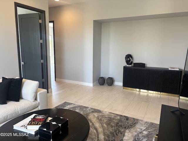 12710 N Sonoran Preserve Blvd Lot 24, Marana, AZ 85658 - living room featuring baseboards