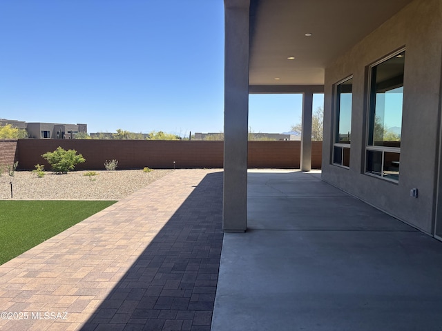 12710 N Sonoran Preserve Blvd Lot 24, Marana, AZ 85658 - fenced backyard with a patio