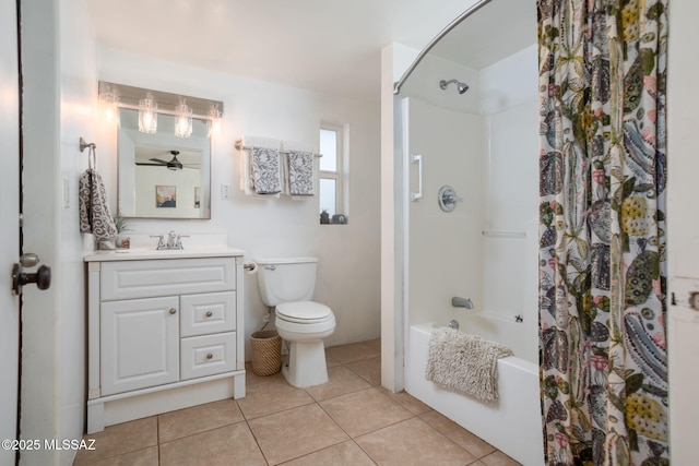 4308 E Elmwood St, Tucson, AZ 85711 - bathroom with vanity, toilet, tile patterned flooring, a ceiling fan, and shower / tub combo with curtain