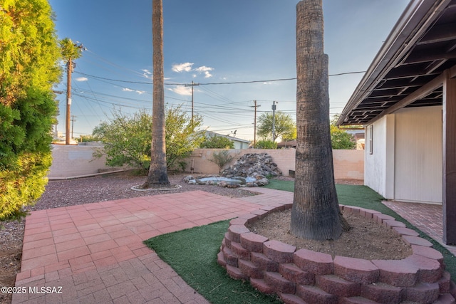4308 E Elmwood St, Tucson, AZ 85711 - fenced backyard featuring a patio
