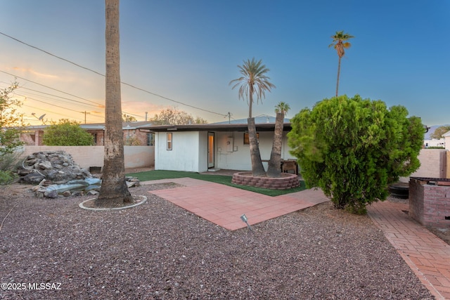 4308 E Elmwood St, Tucson, AZ 85711 - rear view of property featuring a patio