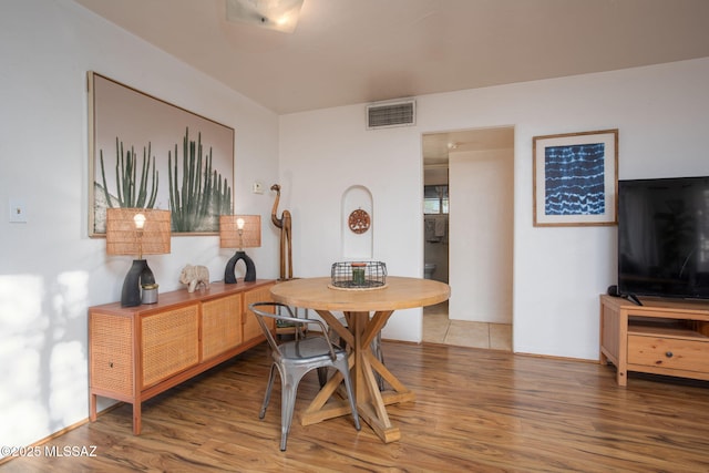 4308 E Elmwood St, Tucson, AZ 85711 - dining space with wood finished floors