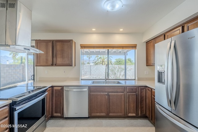 9415 E Simon Pl, Tucson, AZ 85710 - kitchen with appliances with stainless steel finishes, extractor fan, light countertops, and recessed lighting