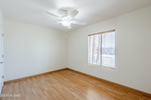 9415 E Simon Pl, Tucson, AZ 85710 - spare room featuring light wood finished floors and ceiling fan