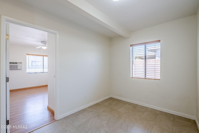9415 E Simon Pl, Tucson, AZ 85710 - spare room with a wall unit AC, ceiling fan, and beamed ceiling