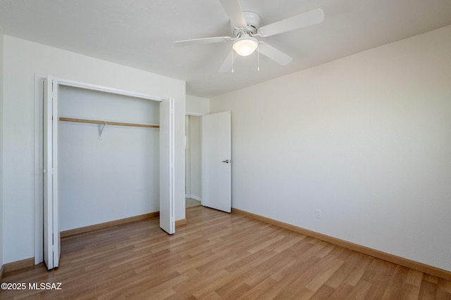 9415 E Simon Pl, Tucson, AZ 85710 - unfurnished bedroom with light wood finished floors, a closet, and ceiling fan