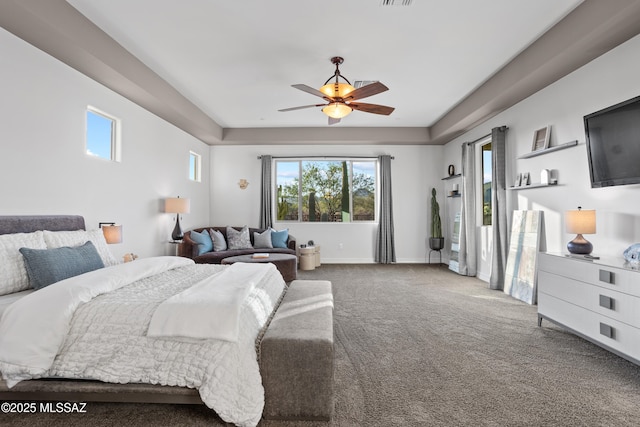 12475 N Faraway Wash Trl, Marana, AZ 85658 - carpeted bedroom featuring multiple windows and ceiling fan
