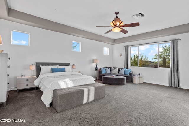 12475 N Faraway Wash Trl, Marana, AZ 85658 - bedroom with carpet floors, multiple windows, and a ceiling fan