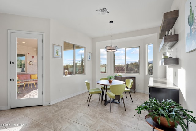 12475 N Faraway Wash Trl, Marana, AZ 85658 - dining area featuring light tile patterned floors