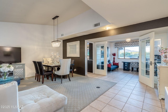 4990 N Kolb Rd, Tucson, AZ 85750 - living area featuring french doors, light tile patterned floors, and a chandelier