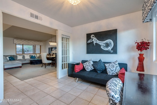 4990 N Kolb Rd, Tucson, AZ 85750 - carpeted living room with tile patterned floors