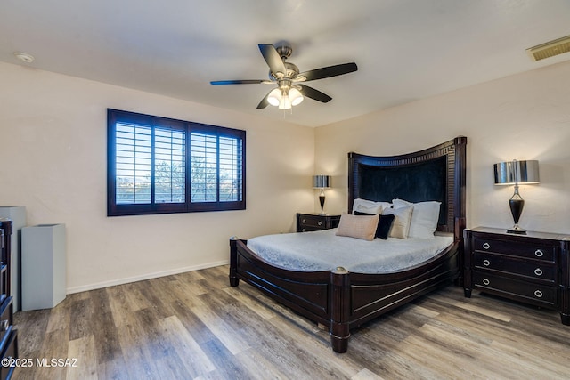 4990 N Kolb Rd, Tucson, AZ 85750 - bedroom featuring wood finished floors and a ceiling fan
