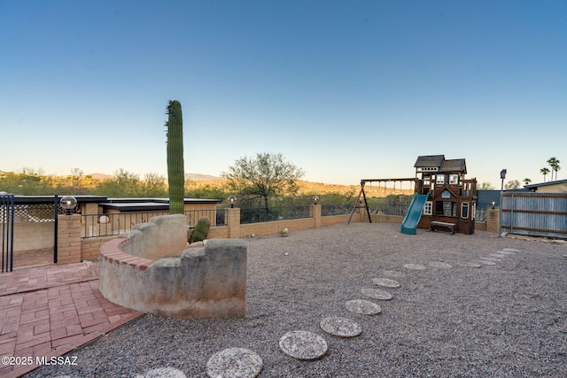 4990 N Kolb Rd, Tucson, AZ 85750 - fenced backyard with a playground
