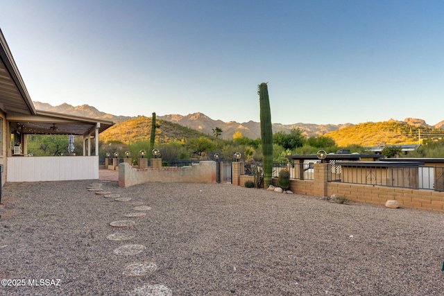 4990 N Kolb Rd, Tucson, AZ 85750 - view of yard with a mountain view and a gate