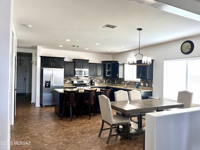 210 W Andrew Potter St, Vail, AZ 85641 - dining area with a chandelier and recessed lighting