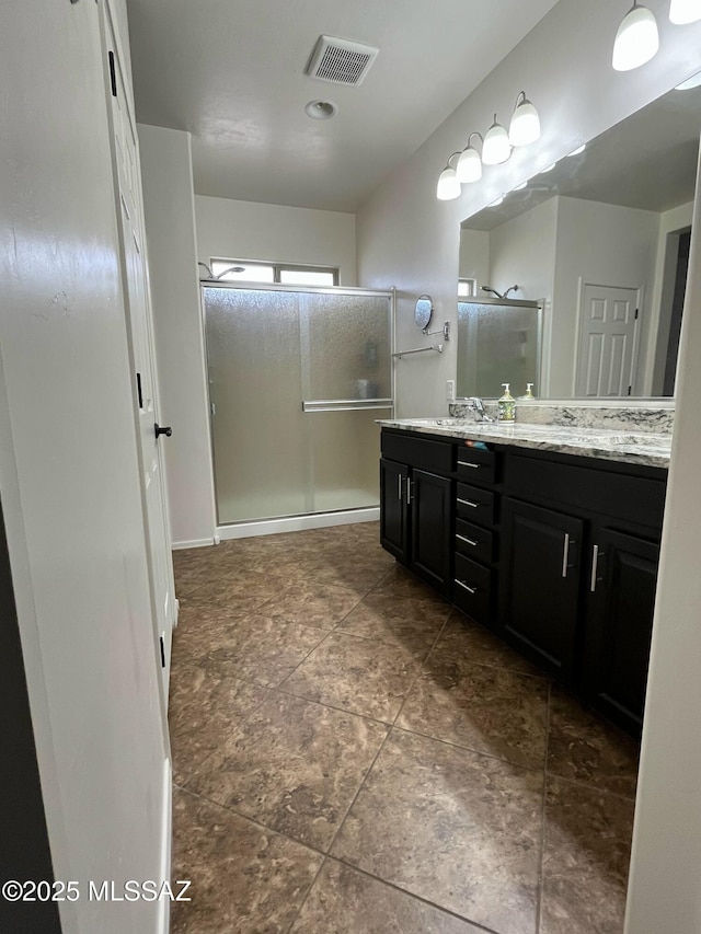 210 W Andrew Potter St, Vail, AZ 85641 - bathroom with a shower stall and double vanity