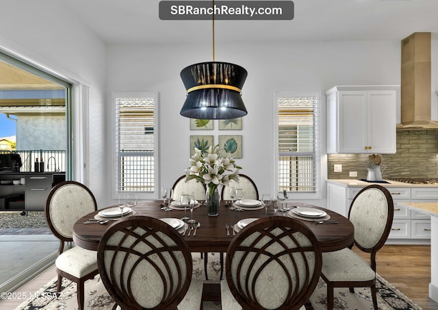 30755 S Chestnut Way, Oracle, AZ 85623 - dining area featuring light wood finished floors and plenty of natural light