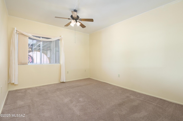 1438 W De Nada, Green Valley, AZ 85622 - carpeted spare room featuring ceiling fan and baseboards