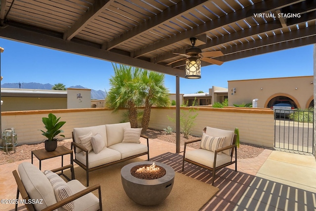 1438 W De Nada, Green Valley, AZ 85622 - view of patio featuring an outdoor living space with a fire pit, a ceiling fan, a mountain view, and a pergola