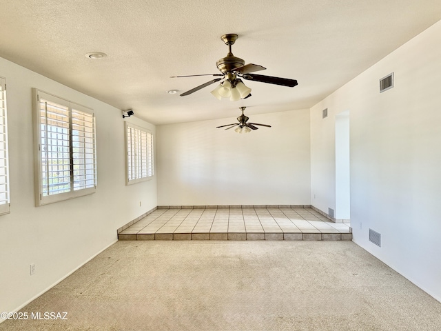 7621 N Placita De Los Amigos, Tucson, AZ 85704 - carpeted empty room with ceiling fan