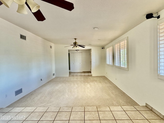 7621 N Placita De Los Amigos, Tucson, AZ 85704 - unfurnished room featuring ceiling fan and light carpet