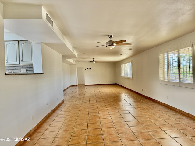 7621 N Placita De Los Amigos, Tucson, AZ 85704 - spare room featuring ceiling fan and light tile patterned flooring