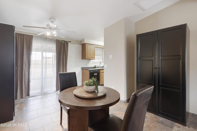 2416 W Placita Algodon, Tucson, AZ 85741 - dining room with a ceiling fan and baseboards
