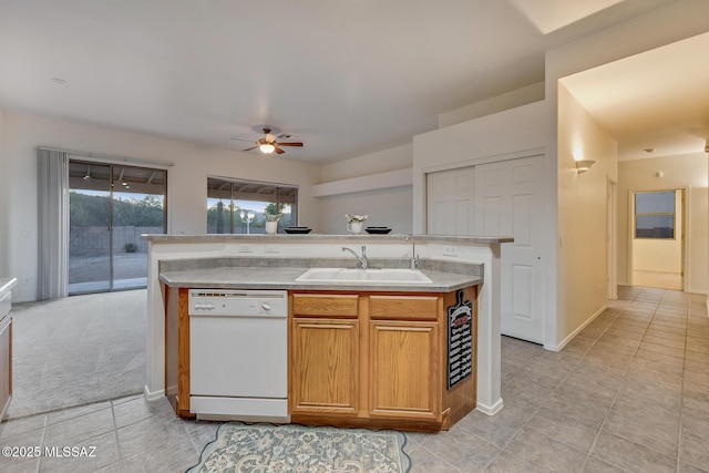 8191 N White Stallion Pl, Tucson, AZ 85743 - kitchen featuring dishwasher, a ceiling fan, light tile patterned floors, light countertops, and a kitchen island with sink