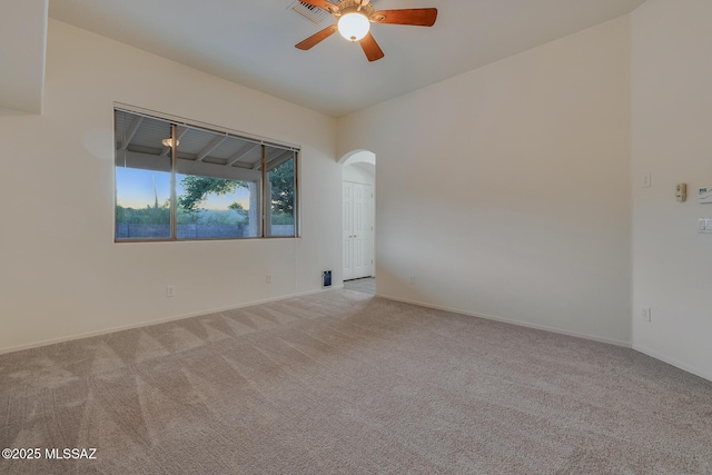 8191 N White Stallion Pl, Tucson, AZ 85743 - carpeted spare room featuring a ceiling fan and arched walkways