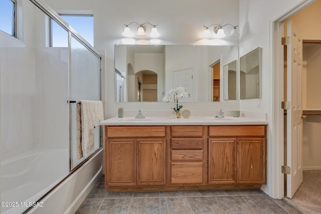 8191 N White Stallion Pl, Tucson, AZ 85743 - full bath with double vanity and bath / shower combo with glass door