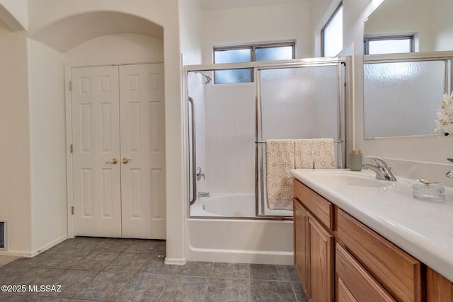 8191 N White Stallion Pl, Tucson, AZ 85743 - full bath featuring vanity, shower / bath combination with glass door, and a closet