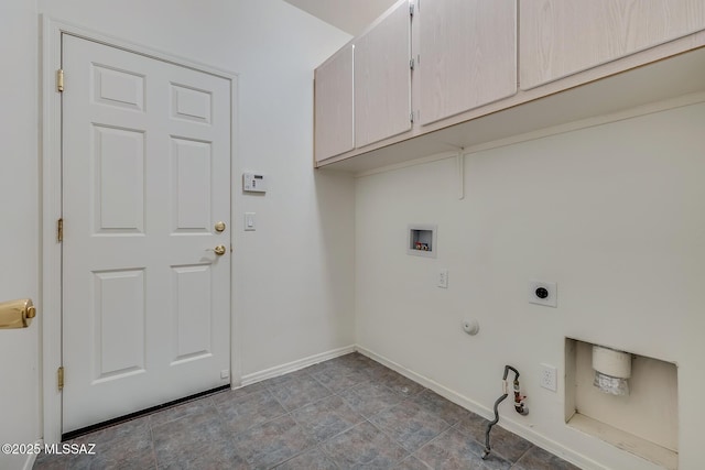8191 N White Stallion Pl, Tucson, AZ 85743 - laundry area featuring hookup for a gas dryer, cabinet space, washer hookup, and hookup for an electric dryer