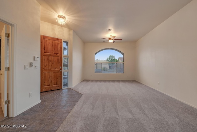 8191 N White Stallion Pl, Tucson, AZ 85743 - tiled foyer entrance with a ceiling fan and carpet flooring