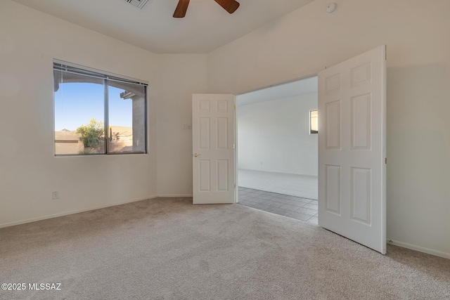 8191 N White Stallion Pl, Tucson, AZ 85743 - spare room featuring carpet, plenty of natural light, and a ceiling fan