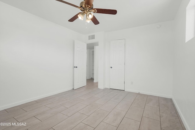 826 W Calle Margarita, Tucson, AZ 85706 - empty room featuring ceiling fan and baseboards