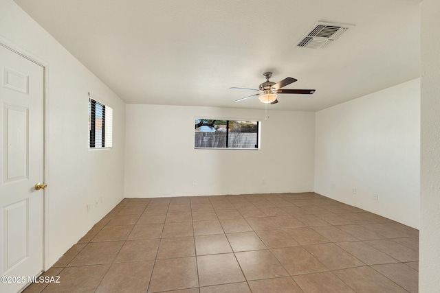 2520 W Vereda De Las Flores, Tucson, AZ 85746 - unfurnished room with ceiling fan and light tile patterned flooring