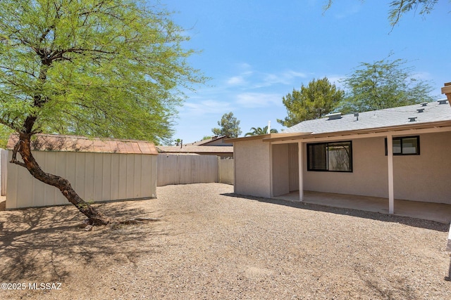 2520 W Vereda De Las Flores, Tucson, AZ 85746 - fenced backyard with a patio area and a storage shed