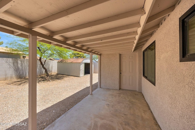 2520 W Vereda De Las Flores, Tucson, AZ 85746 - view of patio / terrace with a storage shed