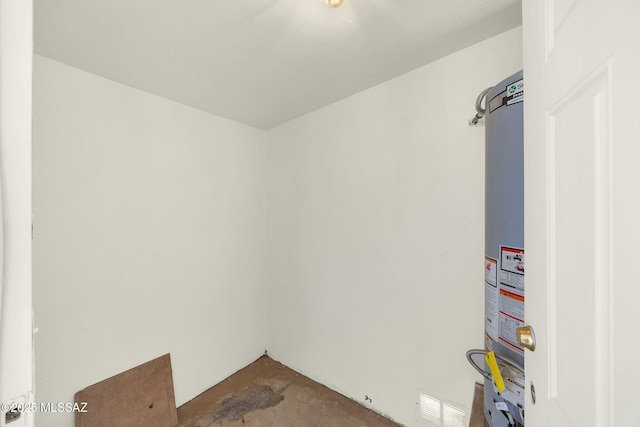 2520 W Vereda De Las Flores, Tucson, AZ 85746 - unfurnished room featuring concrete flooring and water heater
