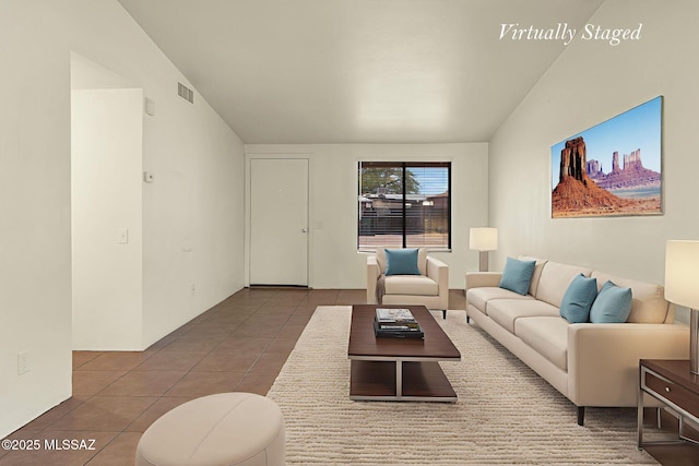 2520 W Vereda De Las Flores, Tucson, AZ 85746 - living room with tile patterned flooring and vaulted ceiling